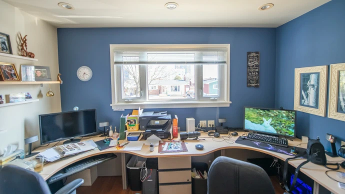 black flat screen computer monitor on brown wooden desk